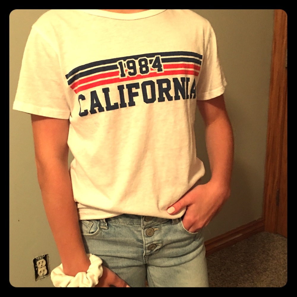 White striped 1984 women’s S tee